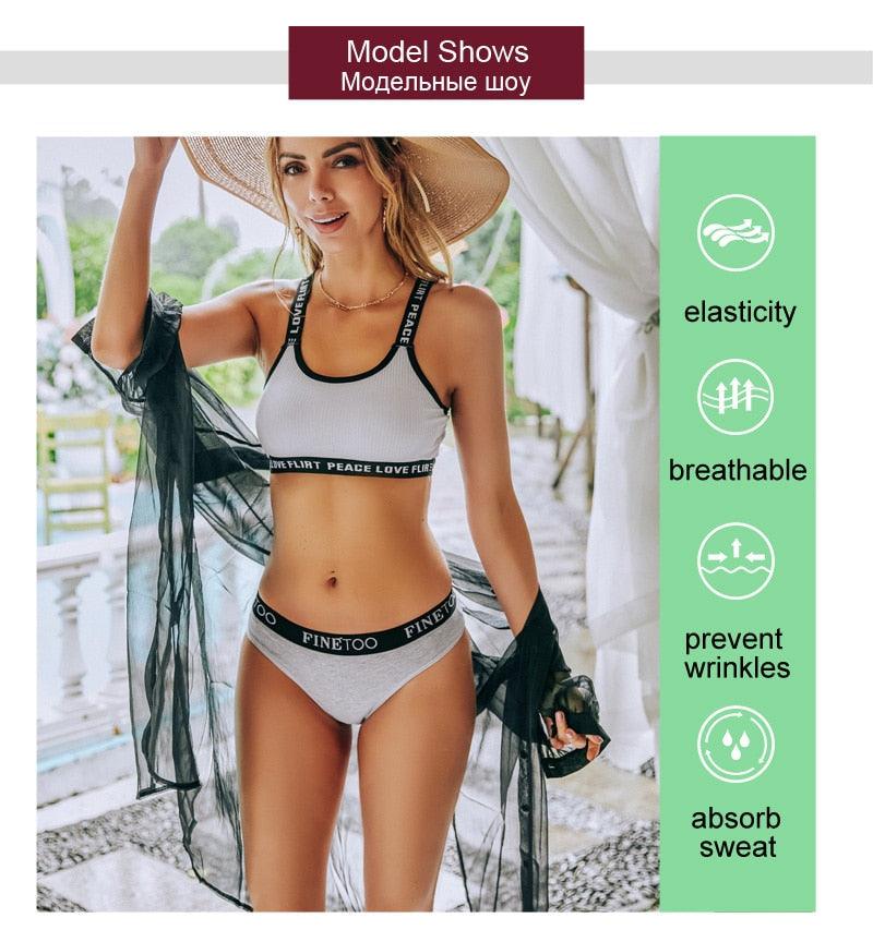 Two pairs of The Clothing Company Sydney cotton seamless briefs in solid colors, low waist, breathable underwear for women.