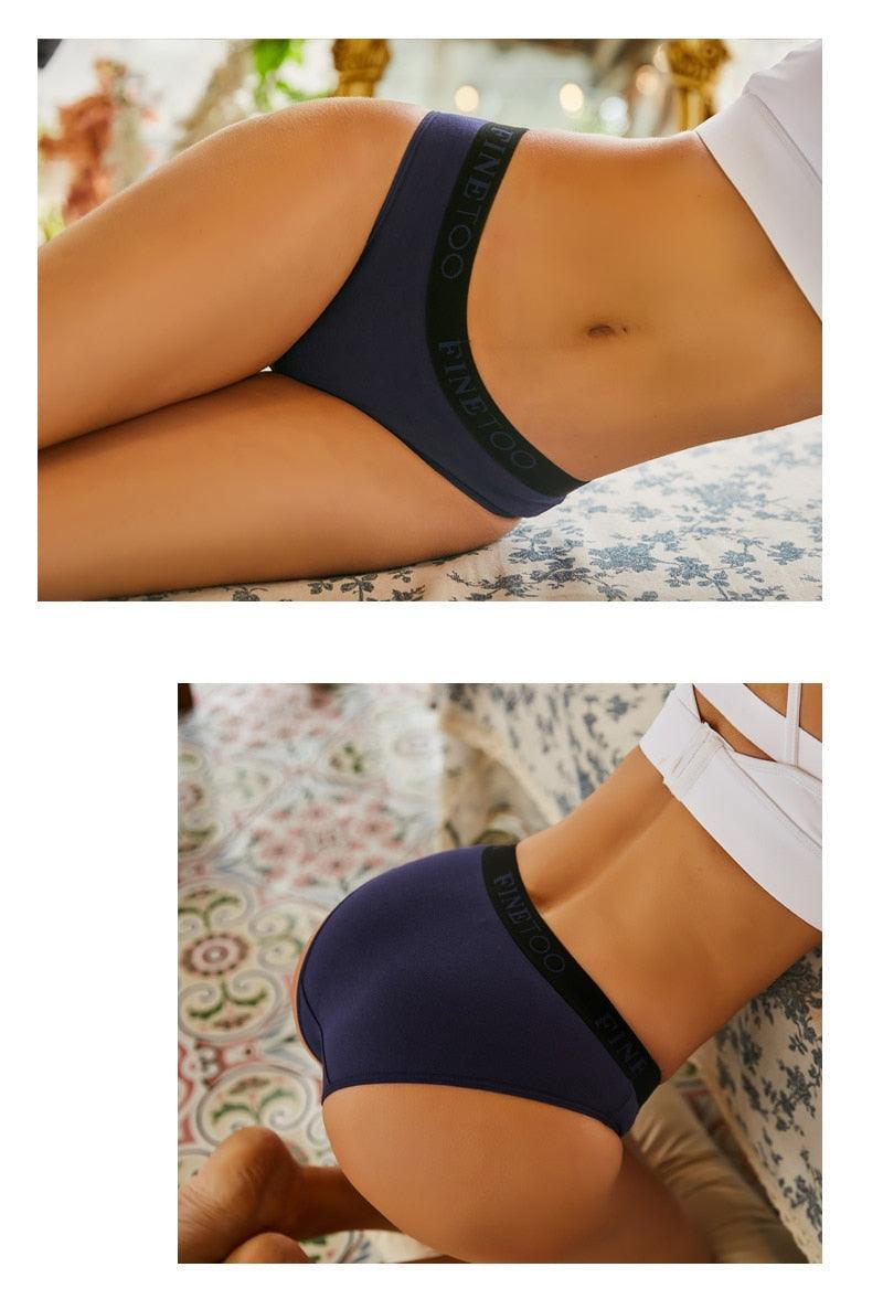 Two pack of The Clothing Company Sydney cotton seamless briefs in solid colors, low waist, breathable, and comfortable underpants.
