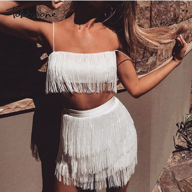 Two-piece summer tassel mini dress from The Clothing Company Sydney featuring off-shoulder design with fringe embellishments.