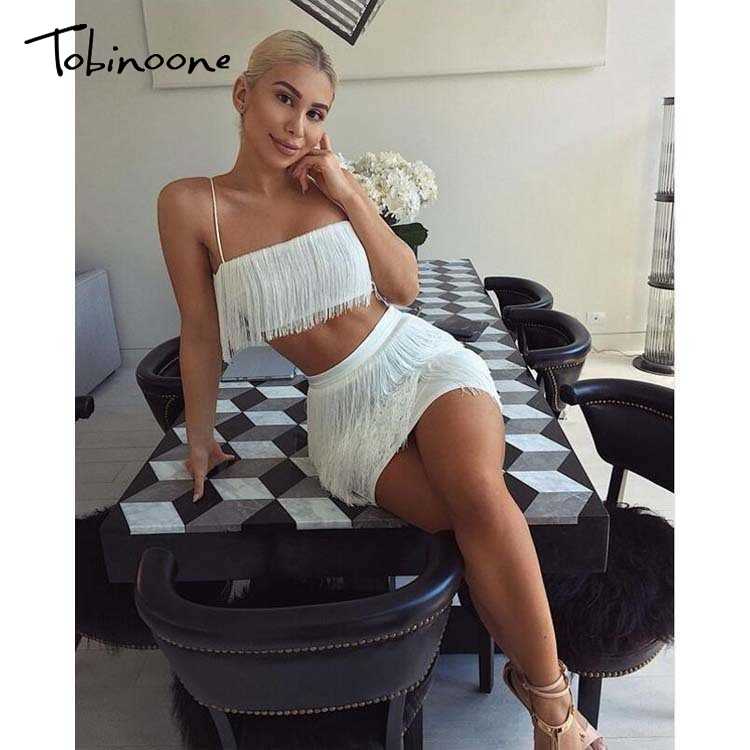 Elegant off-shoulder mini fringe dress with tassel embellishments by The Clothing Company Sydney, perfect for summer parties.