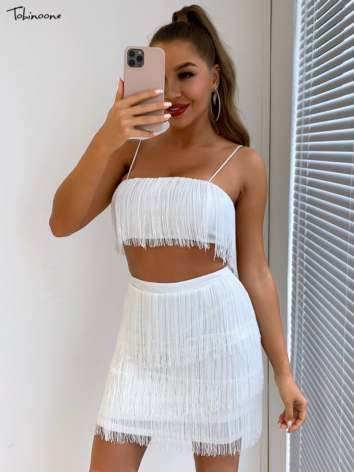 Elegant off-shoulder summer tassel dress by The Clothing Company Sydney featuring mini fringe and embellished details.