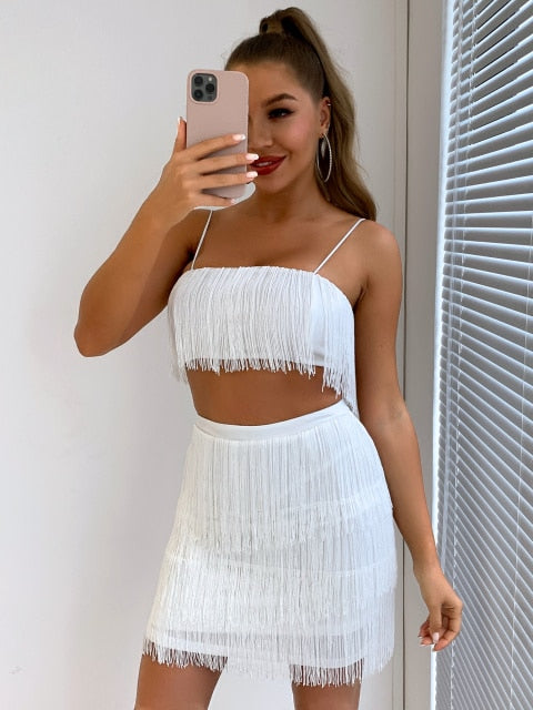 Elegant off-shoulder tassel mini dress by The Clothing Company Sydney featuring fringe embellishments for summer club parties.