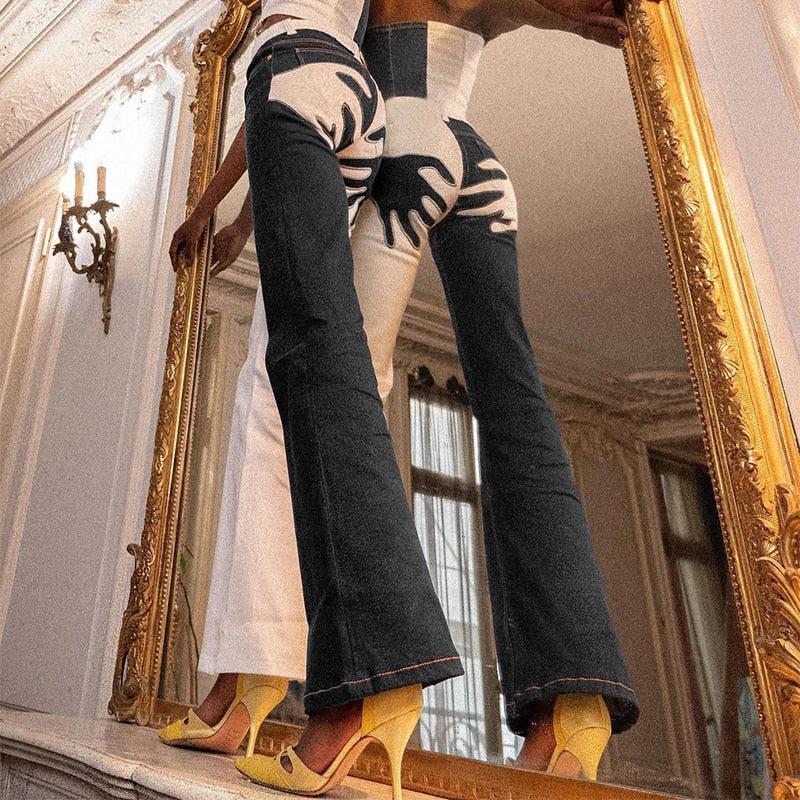 Vintage flare jeans by The Clothing Company Sydney featuring embroidery, patchwork, and casual streetwear style in denim.