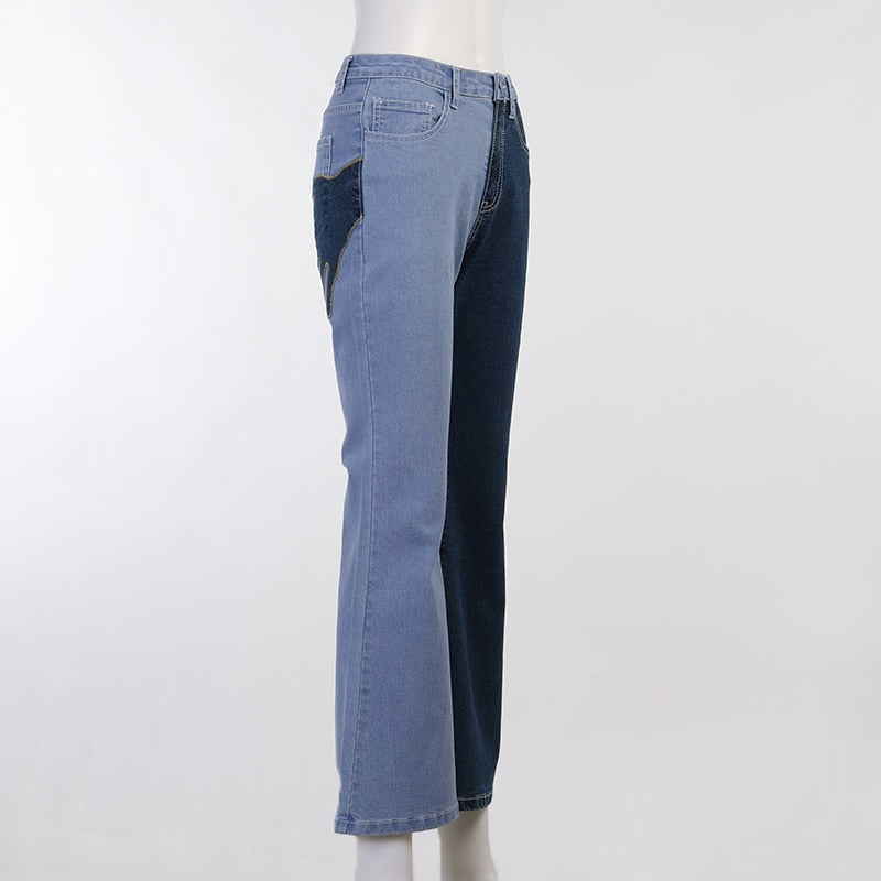 Vintage flare jeans from The Clothing Company Sydney featuring embroidery, patchwork details, and casual streetwear style.
