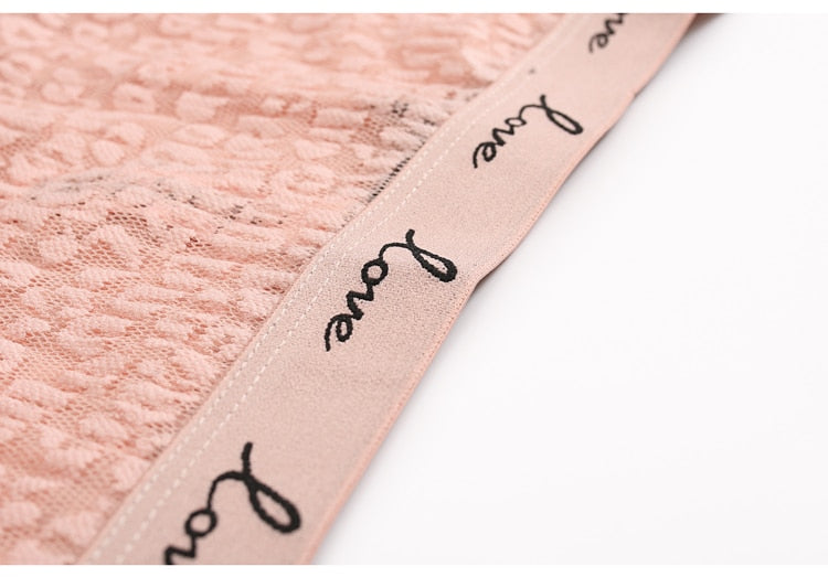 Low-waist lace G-string underwear with transparent fabric and LOVE letter embroidery, designed as delicate lingerie by The Clothing Company Sydney.