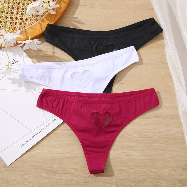 Three-pack cotton mix panties from The Clothing Company Sydney featuring lace, transparent heart designs, and seamless low-waist briefs.
