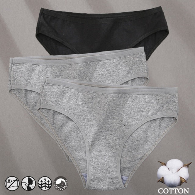 Three-pack of cotton mix panties with jacquard pattern, solid colors, lightweight underwear, and comfortable lingerie briefs.