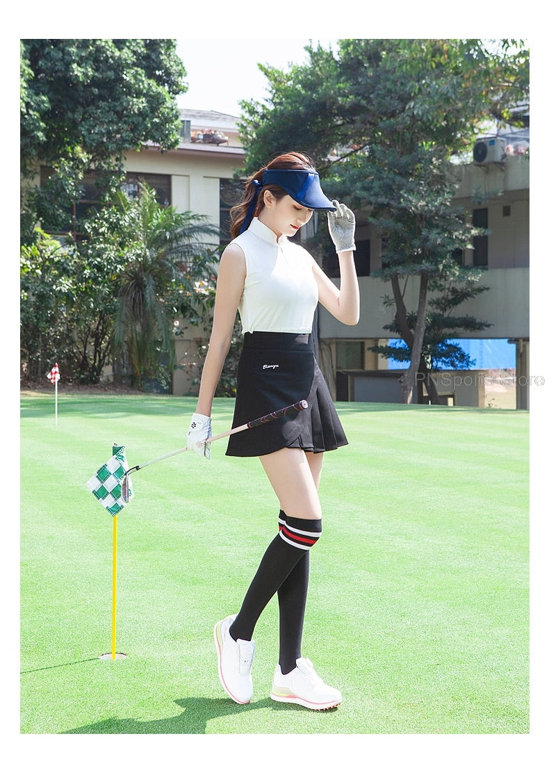 Ladies golf skirt set by The Clothing Company Sydney featuring sleeveless slim top and pleated dry-fit tennis skirt.