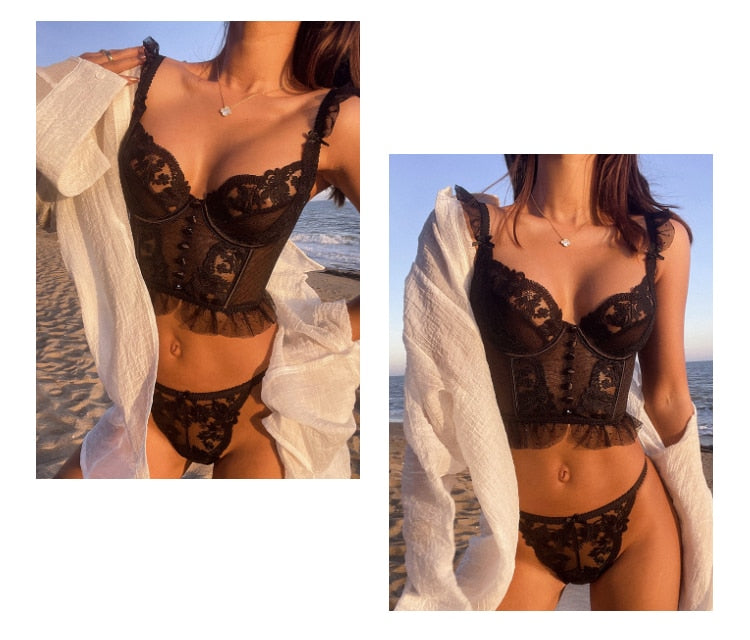 French lingerie underwear set by The Clothing Company Sydney featuring a white lace push-up bra and matching transparent panties.