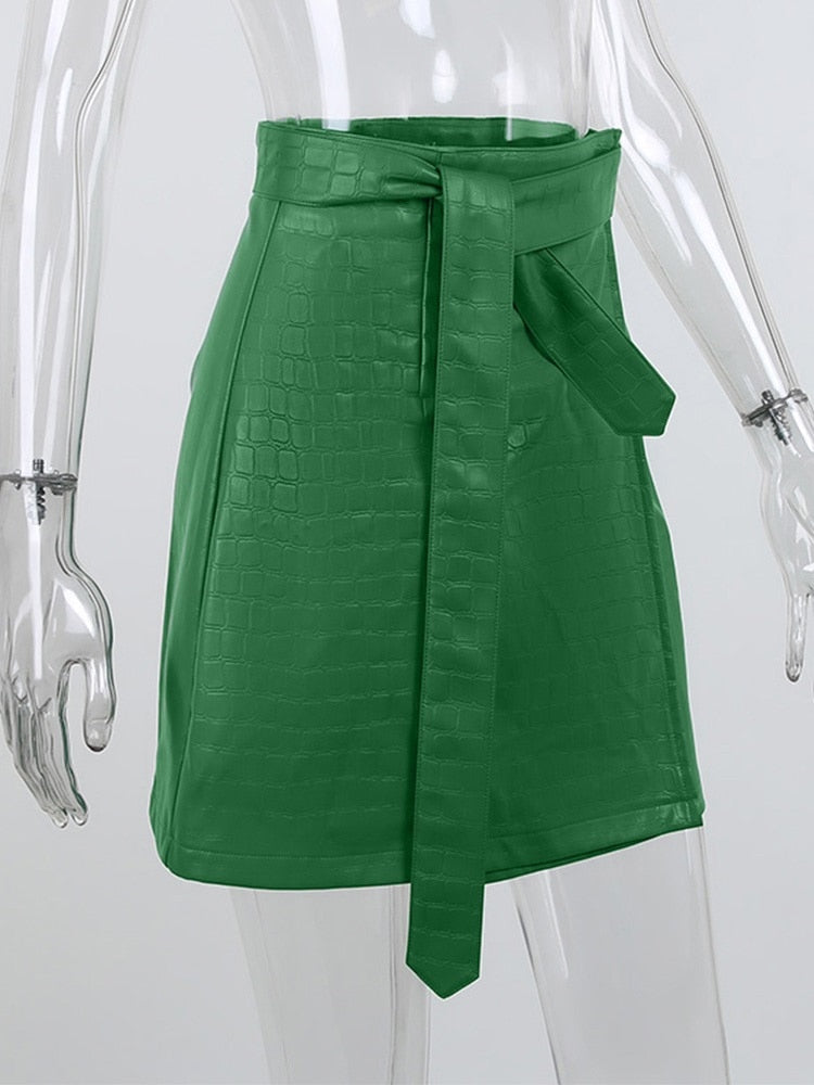 Green faux leather crocodile pattern A-line skirt with high waist and split detail, stylish mini skirt by The Clothing Company Sydney.