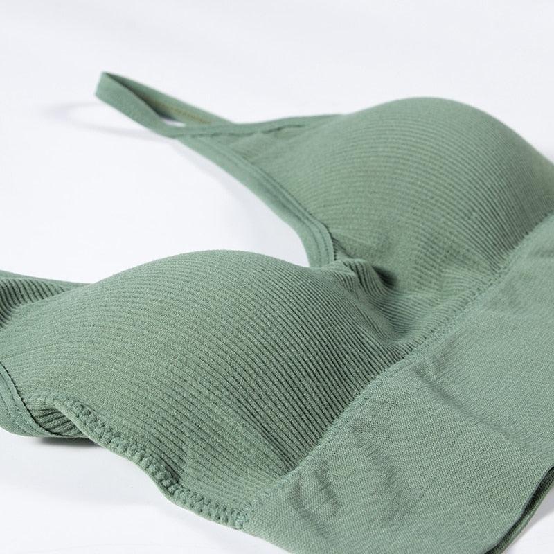 Two seamless U-type backless bralettes from The Clothing Company Sydney, wire-free push-up bras, ideal for comfortable, invisible support.