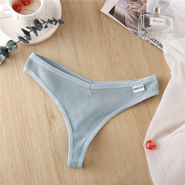 Two pairs of cotton mix G-string thong underwear with V-waist design from The Clothing Company Sydney, shown laid flat.