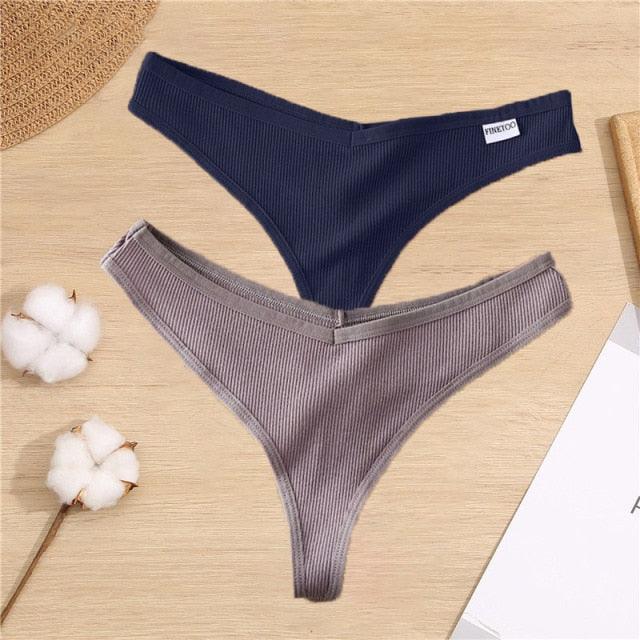 Two cotton mix G-string thong underwear with V-waist design, in black and white, from The Clothing Company Sydney.