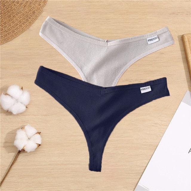 Two pack of cotton mix G-string thong underwear with V-waist design from The Clothing Company Sydney, showing black and nude colors.