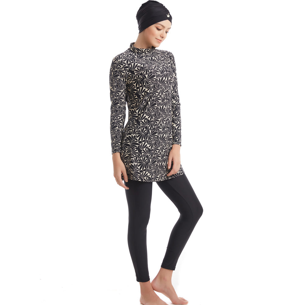 Plus size 3-piece swimwear set by The Clothing Company Sydney featuring full coverage long sleeve swimsuits for women.
