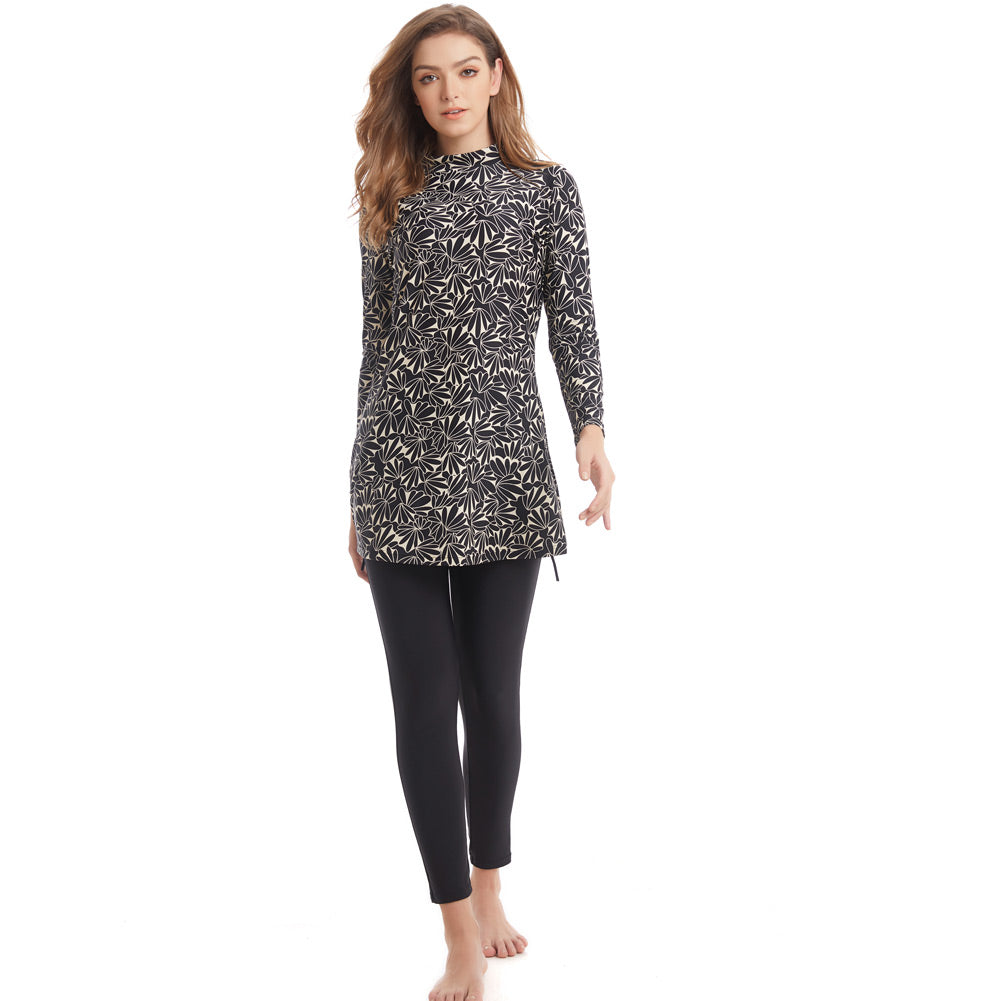 Plus size long sleeve swimsuit by The Clothing Company Sydney, full coverage swimwear with three-piece design for women.