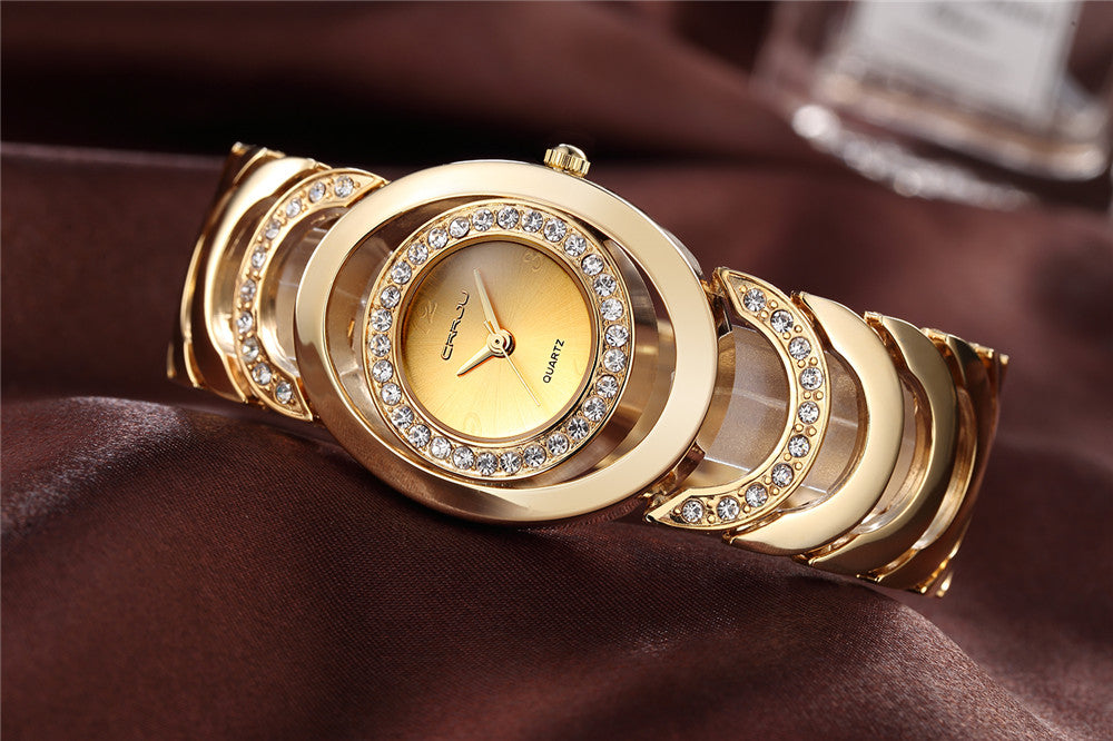 Ladies' luxury stainless steel bracelet watch with rhinestones and quartz movement, stylish accessory from The Clothing Company Sydney.
