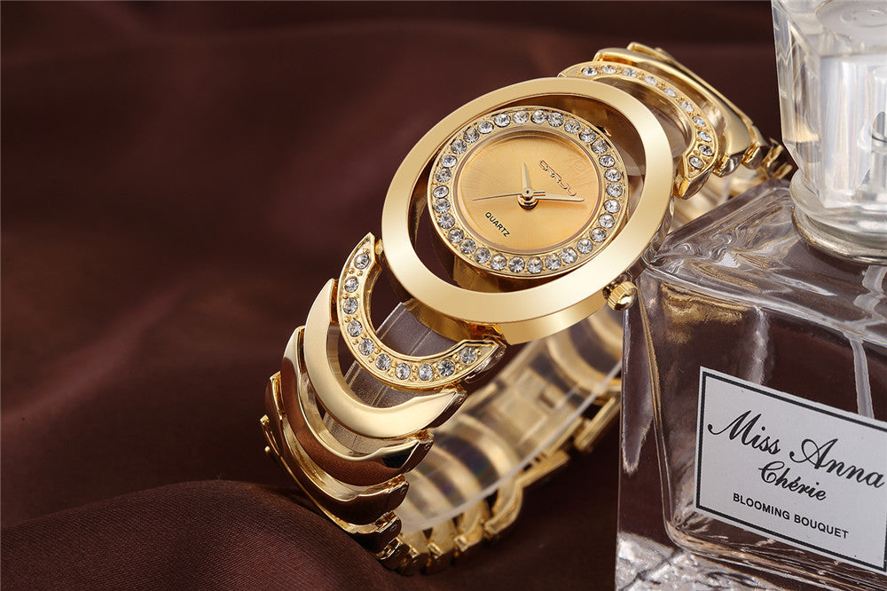 Ladies' luxury stainless steel bracelet watch with rhinestones and quartz movement, stylish accessory from The Clothing Company Sydney.