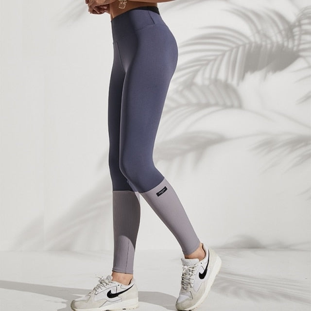 High-waist quick-dry sport leggings from The Clothing Company Sydney, tight fit for yoga and workout activities.