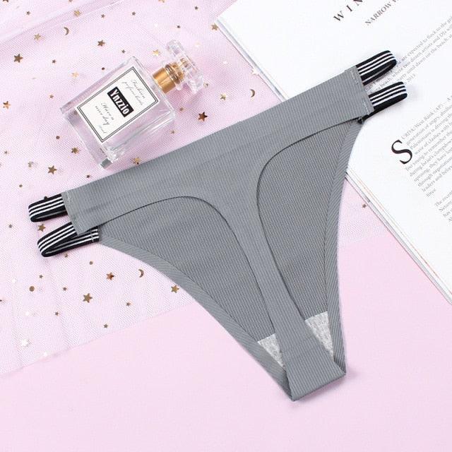 Two seamless thong panties from The Clothing Company Sydney, featuring elegant lace and comfortable G-string design.