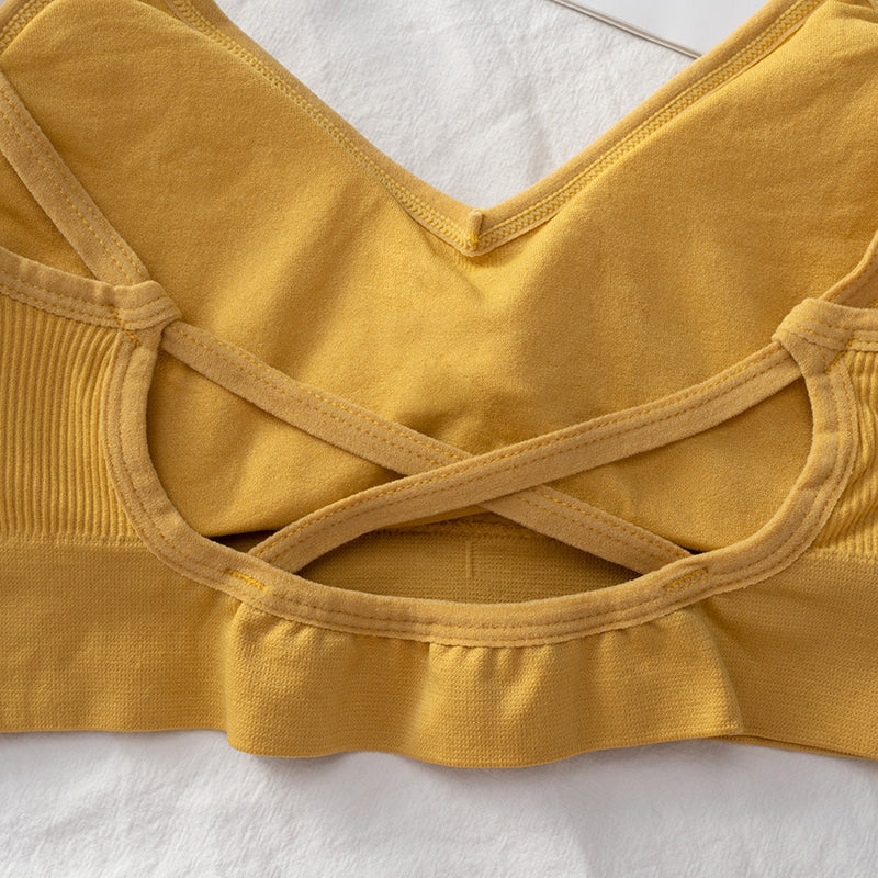 Seamless black crop top bra from The Clothing Company Sydney, backless lingerie with padded cups and sporty fit.