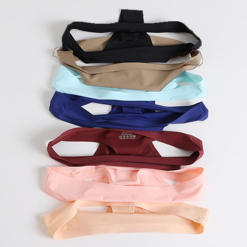 Three-pack of satin seamless G-string panties from The Clothing Company Sydney, featuring soft, stretchy lingerie underpants and briefs.