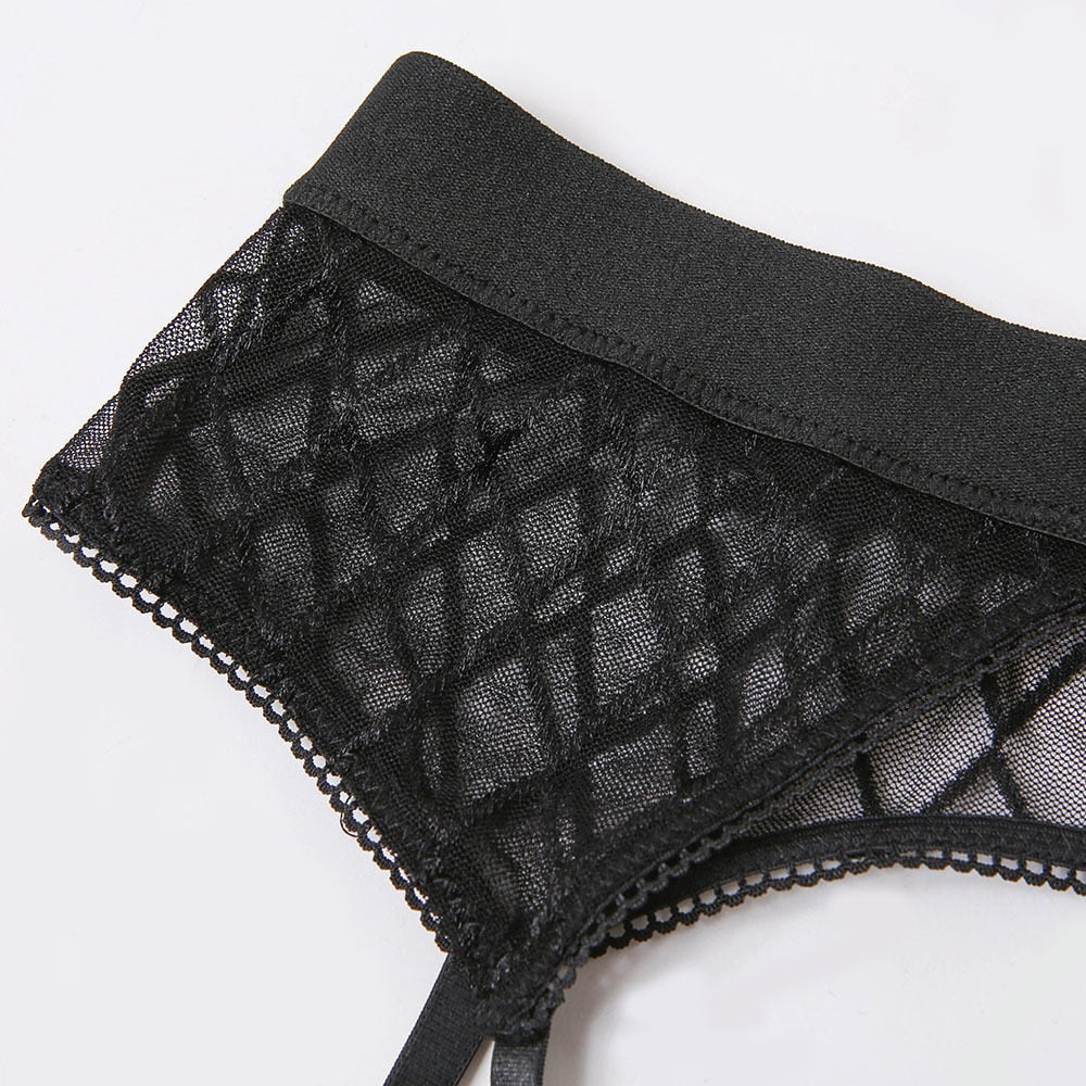 Black plaid underwear brief set with lace bras and garter, featuring transparent lingerie details by The Clothing Company Sydney.
