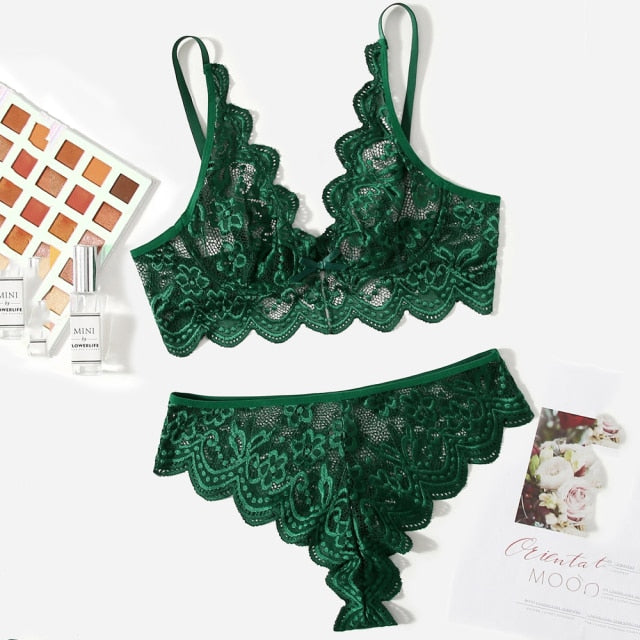 Two-piece lingerie set from The Clothing Company Sydney featuring deep-V lace briefs and see-through seamless intimates.