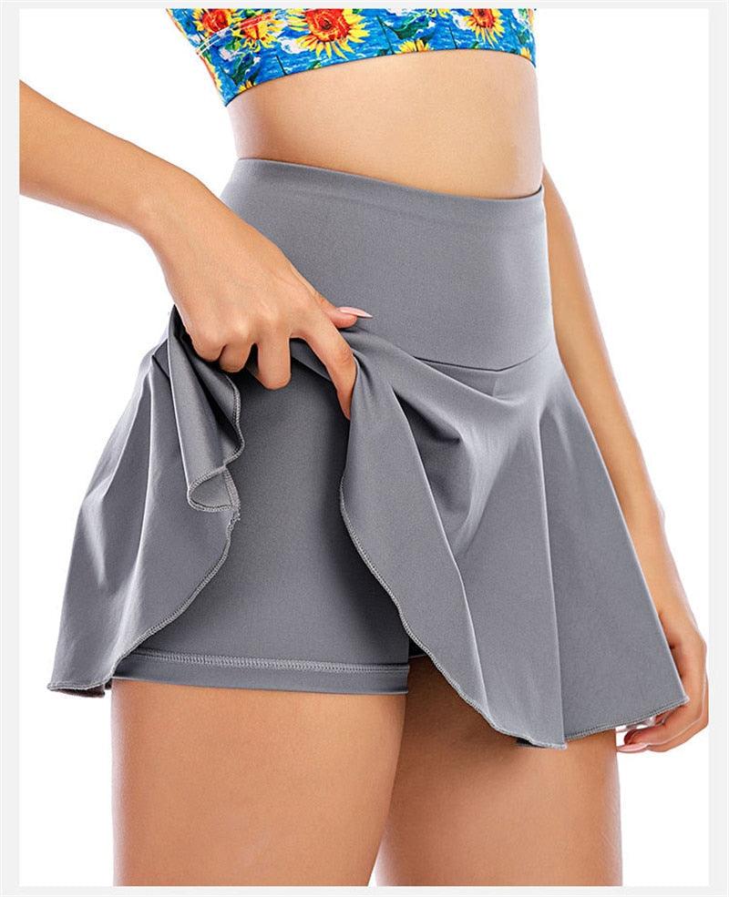Two-in-one sports gym golf and tennis skirt with pleated design, suitable for running, yoga, and fitness activities.