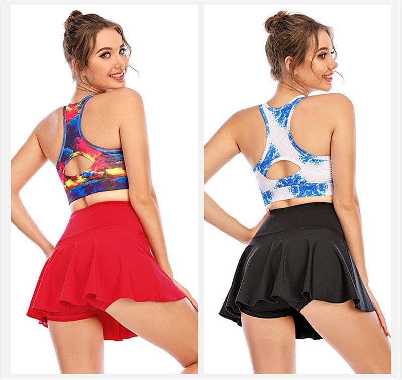 Black 2-in-1 sports gym golf and yoga skorts with pleated tennis skirt design, from The Clothing Company Sydney.