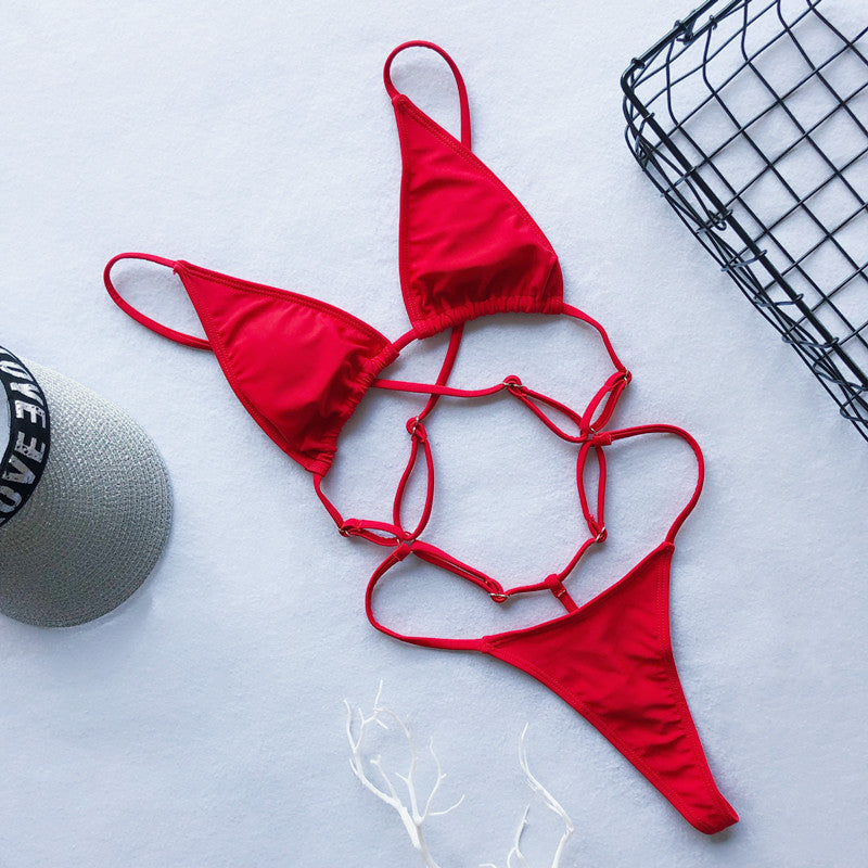 Backless high cut out G-string one-piece swimsuit by The Clothing Company Sydney, featuring minimal coverage and sleek swimwear design.