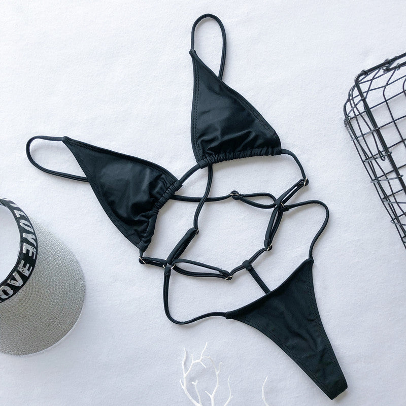 Backless high cut out G-string one-piece swimsuit by The Clothing Company Sydney with micro thong design and bold cutouts.