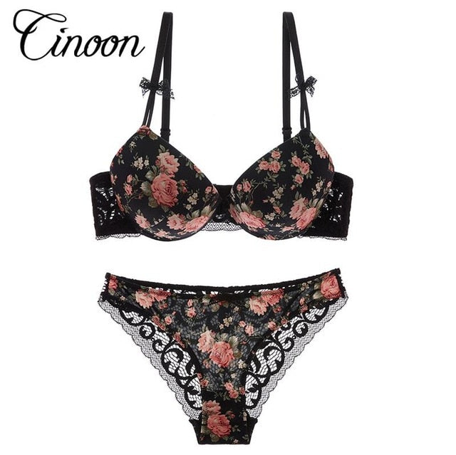 Silk lace floral push-up bra and hollow-out panties set by The Clothing Company Sydney, featuring delicate lace and floral details.