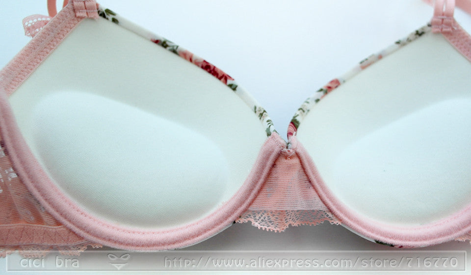 Silk lace floral push-up bra and hollow-out panties set from The Clothing Company Sydney, featuring elegant lingerie design.