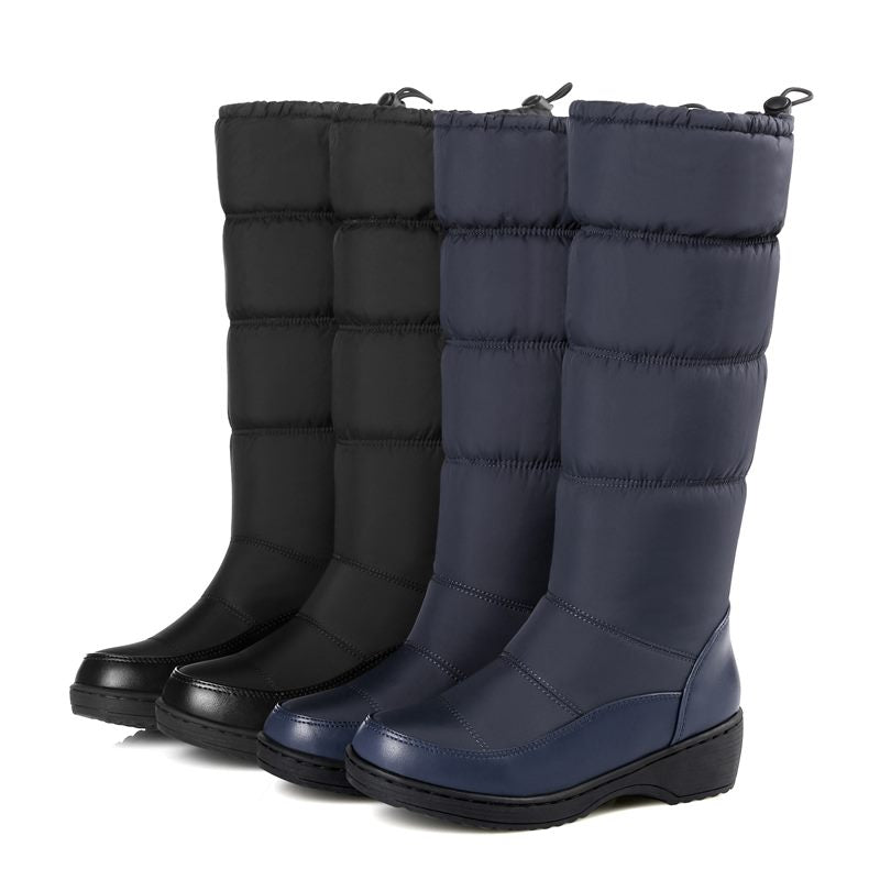 Below knee high snow boots from The Clothing Company Sydney with round toe, soft PU leather, designed for winter footwear.