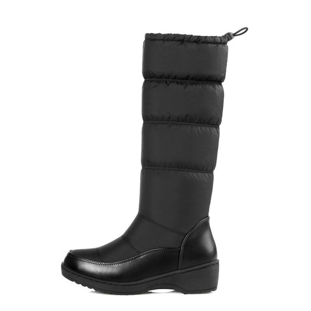 Below knee high snow boots by The Clothing Company Sydney featuring round toe, soft PU leather, and winter-ready design.