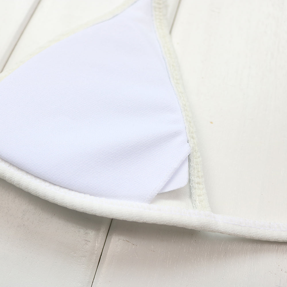 Two-piece thong micro bikini swimsuit in five colors, featuring minimal coverage and sleek design by The Clothing Company Sydney.