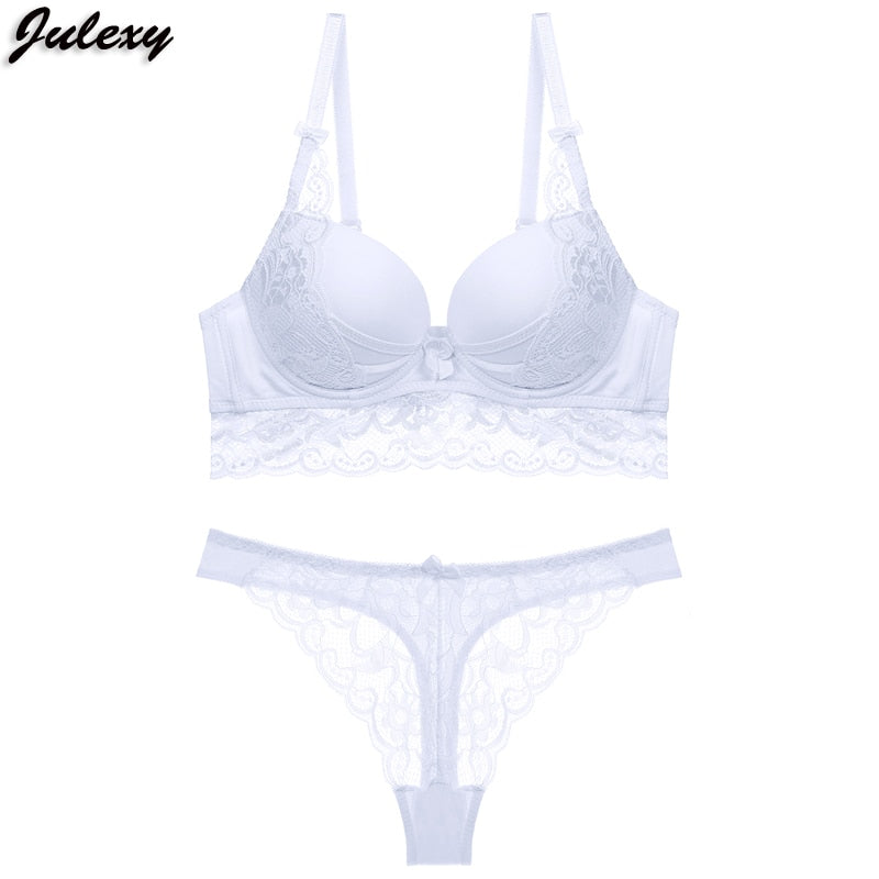 Lingerie set with lace hollow bra and G-string thong in black, featuring delicate lace details and sheer fabric.