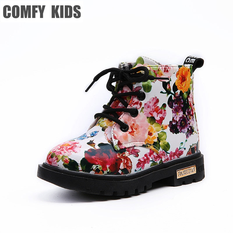 Kids' floral print PU leather shoes and rubber boots for girls by The Clothing Company Sydney, featuring elegant flower designs.