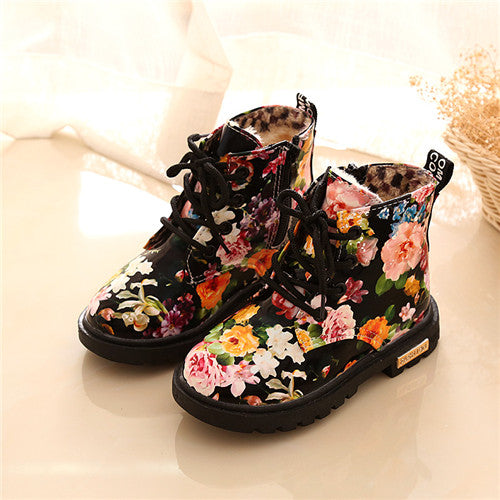 Kids' floral print PU leather shoes with rubber soles by The Clothing Company Sydney, featuring an elegant flower design for girls.