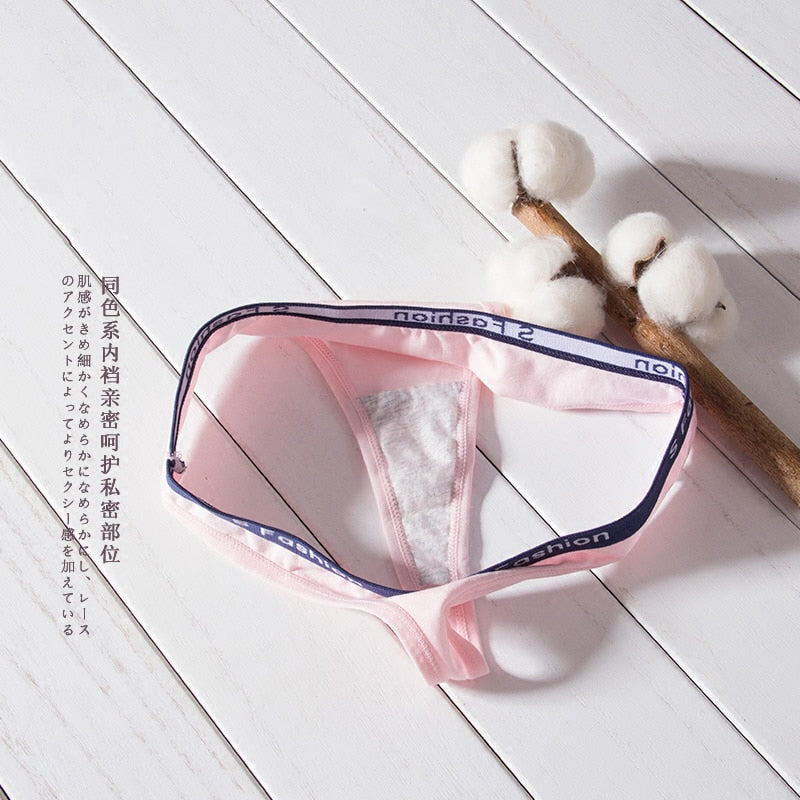Three-pack of G-string cotton mix panties from The Clothing Company Sydney, seamless T-back thongs with low-rise waist and transparent briefs.