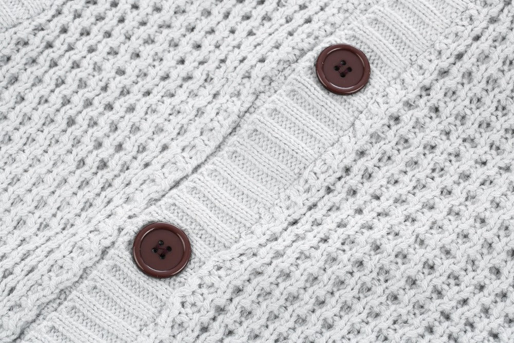 Loose fit knitted cardigan from The Clothing Company Sydney, button-up casual sweater with a relaxed style and soft knit fabric.