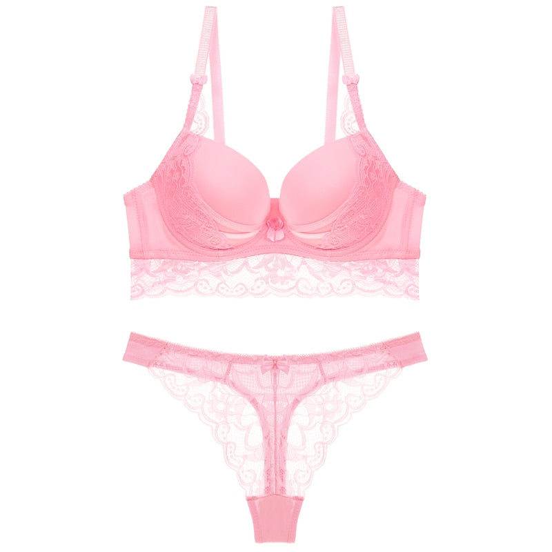 Lace hollow bra and G-string thong lingerie set from The Clothing Company Sydney, featuring delicate lace details and a revealing design.