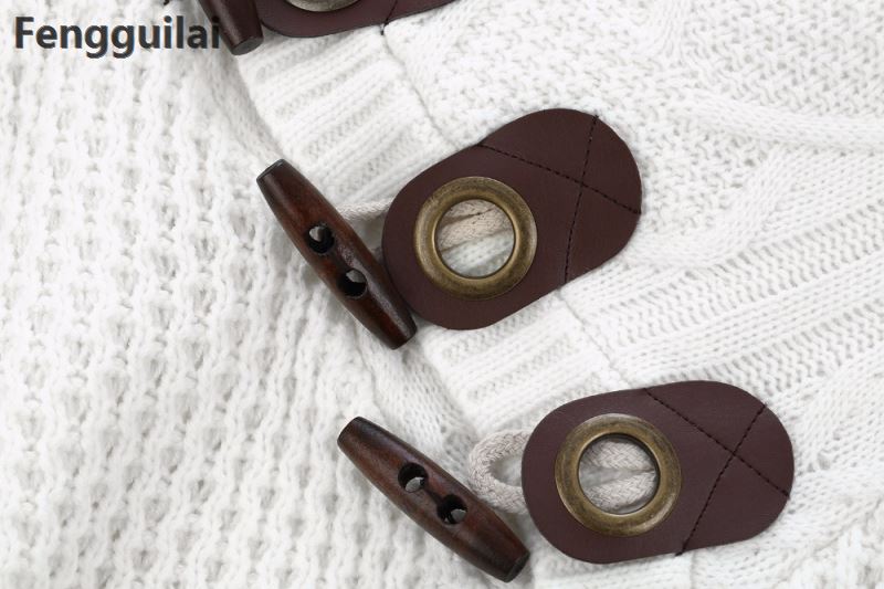 Loose fit knitted cardigan from The Clothing Company Sydney featuring a button-up casual sweater with a relaxed style and textured knit.