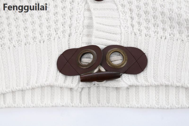 Loose fit knitted cardigan from The Clothing Company Sydney, featuring button-up casual style and soft knit fabric.