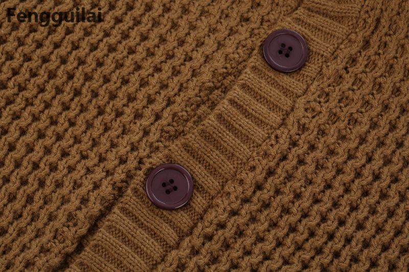 Loose fit knitted cardigan from The Clothing Company Sydney, casual button-up sweater with a relaxed, cozy style.