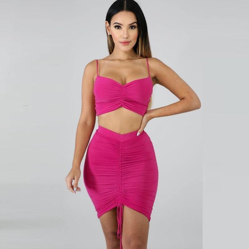 Green summer two-piece dress set for women featuring a ruched crop top and matching skirt, perfect for club wear.