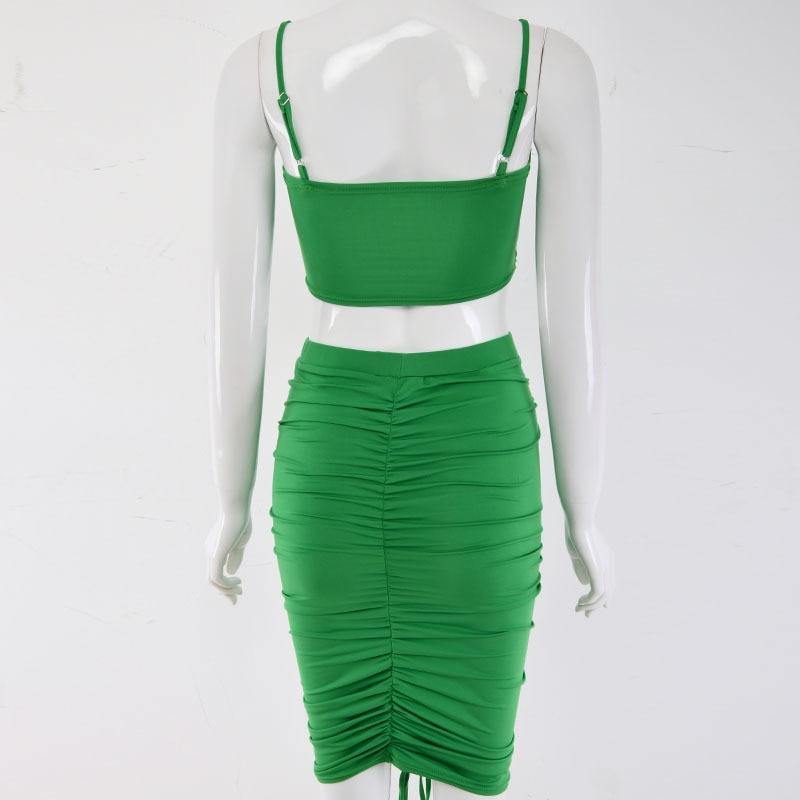 Green summer two-piece outfit for women featuring a ruched crop top and skirt set by The Clothing Company Sydney.