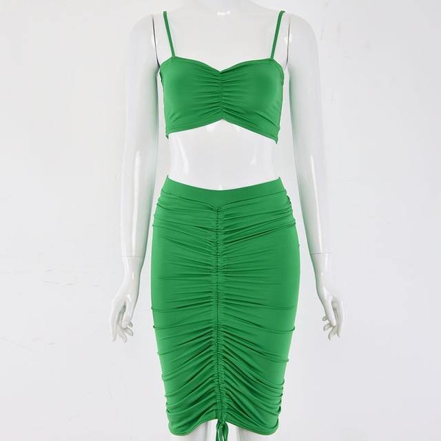 Green summer two-piece dress set for women featuring a ruched crop top and matching skirt, perfect for club wear.