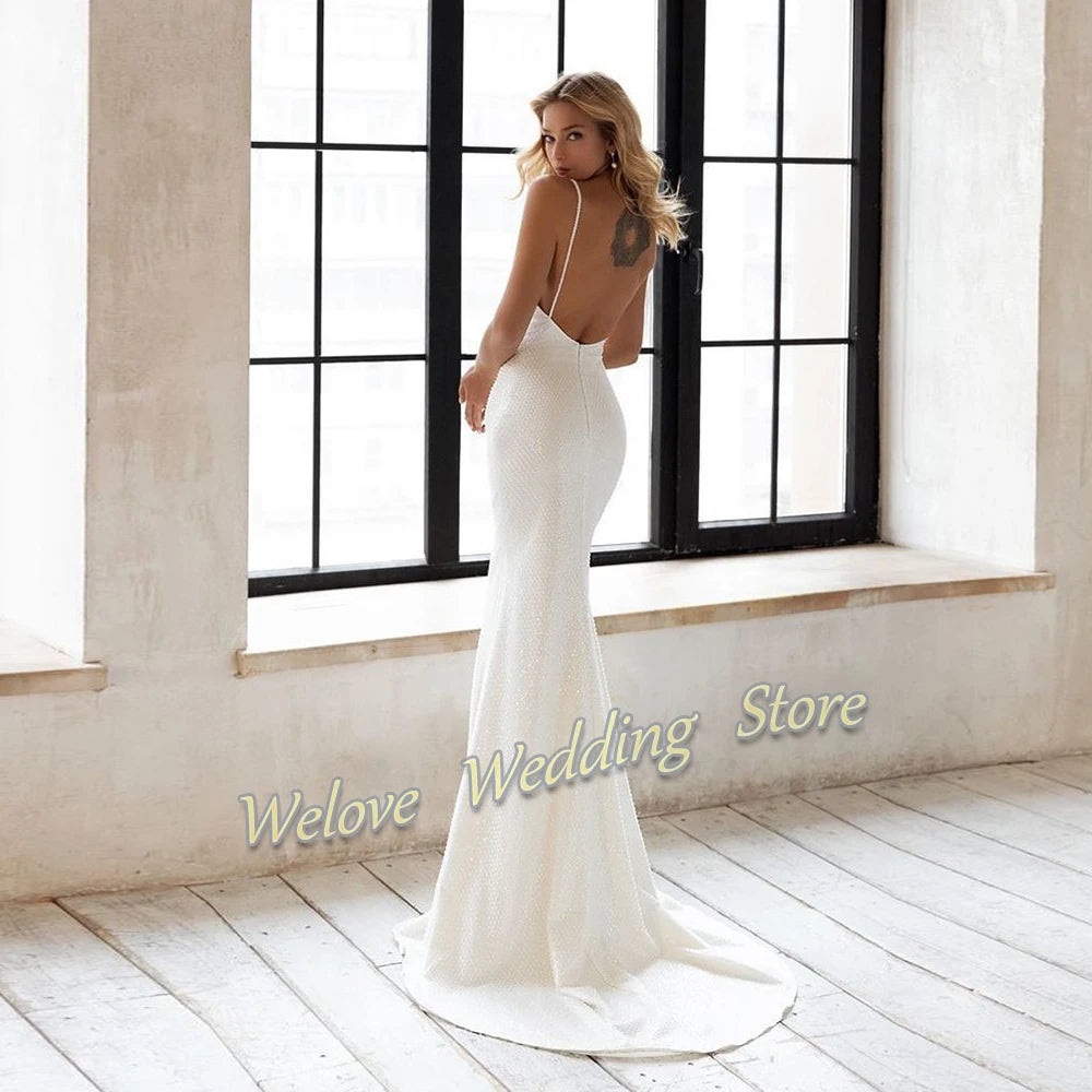 Beach A Line Chiffion Wedding Dresses V-neck Spaghetti Straps Backless Button Boho Bridal Gowns